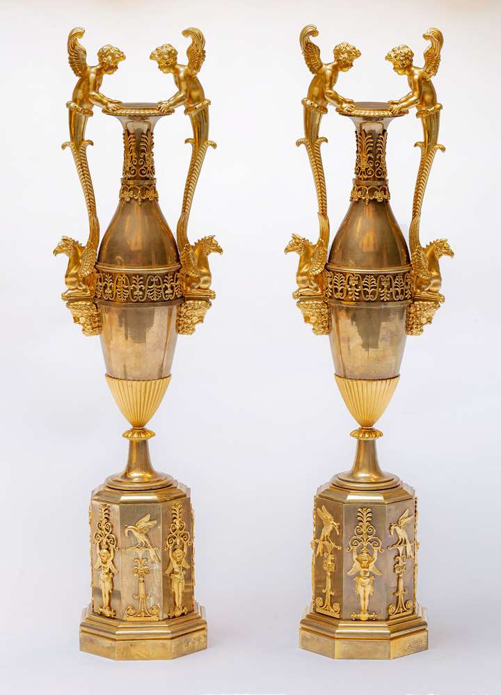 A fine pair of Empire ormolu and patinaed bronze vases "aux amours"